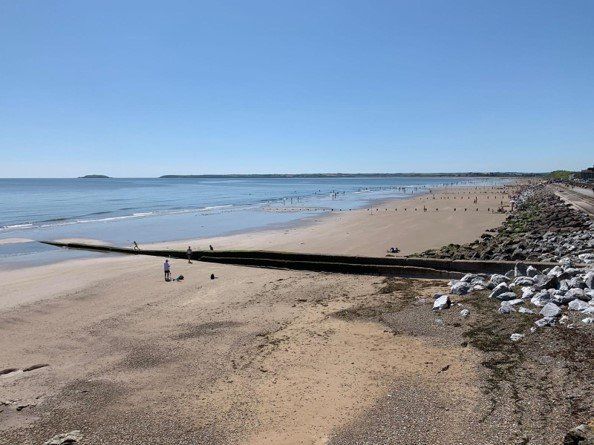 View over front strand from across the road from Island View. Capel Island and Knockadoon in the distance. Life guards in operation during Summer.